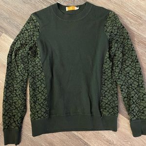 Tory Burch long sleeve sweater size M with lace detailing on sides and sleeves